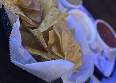 Fronteras Restaurant - Tortilla Chips with Trio Dip consisting of guacamole, cheese dip, and salsa