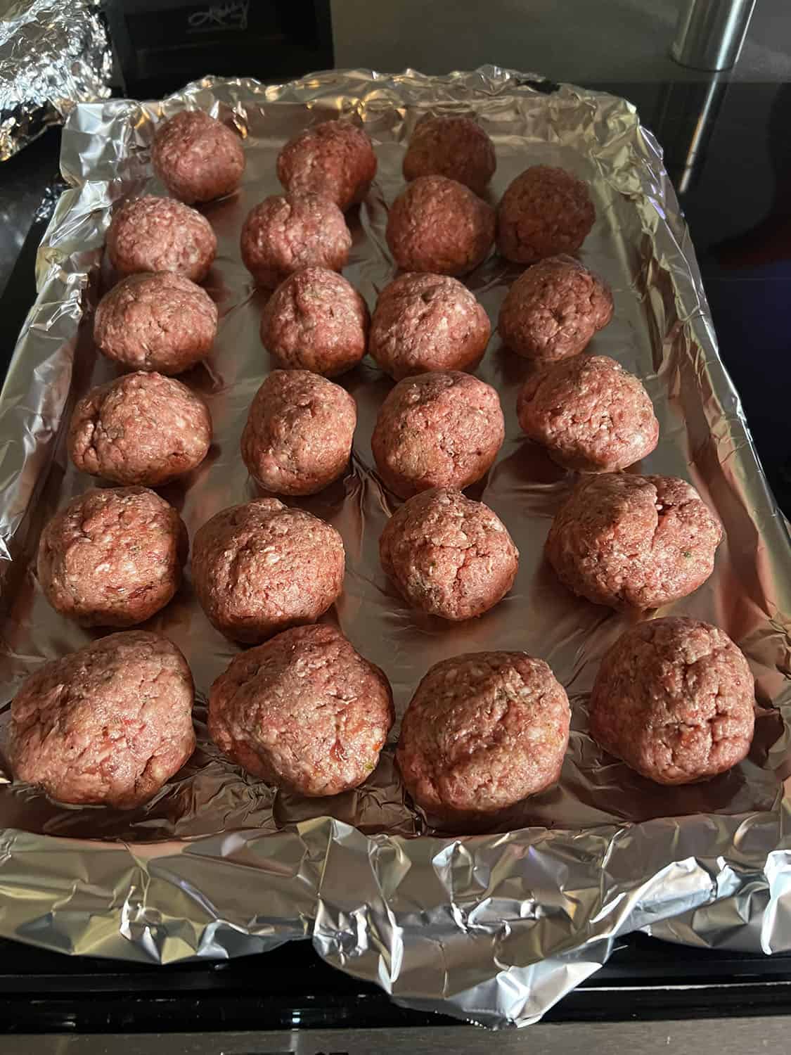 Meatballs at our home getting ready to go into an oven